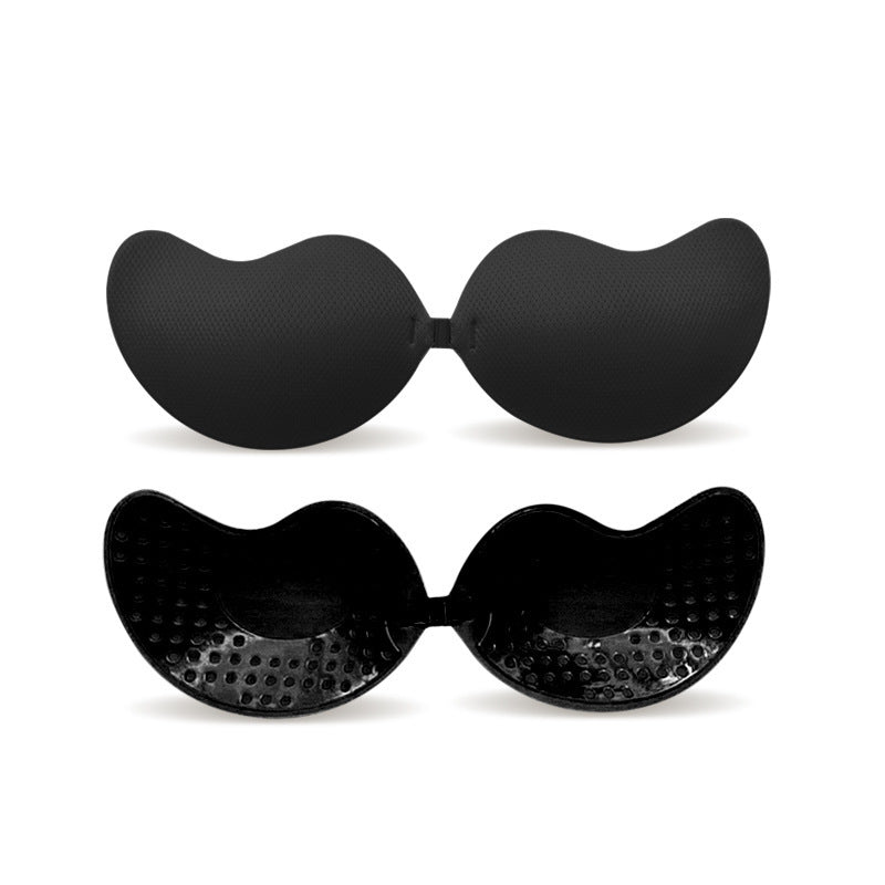 Black sticky backless and strapless bras on a white background